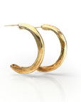 Elegant gold-plated J-hoop earrings, Slate Hoop design, featuring a curved crescent shape with a smooth, polished finish. Understated yet sophisticated jewelry piece ideal for complementing classic outfits.